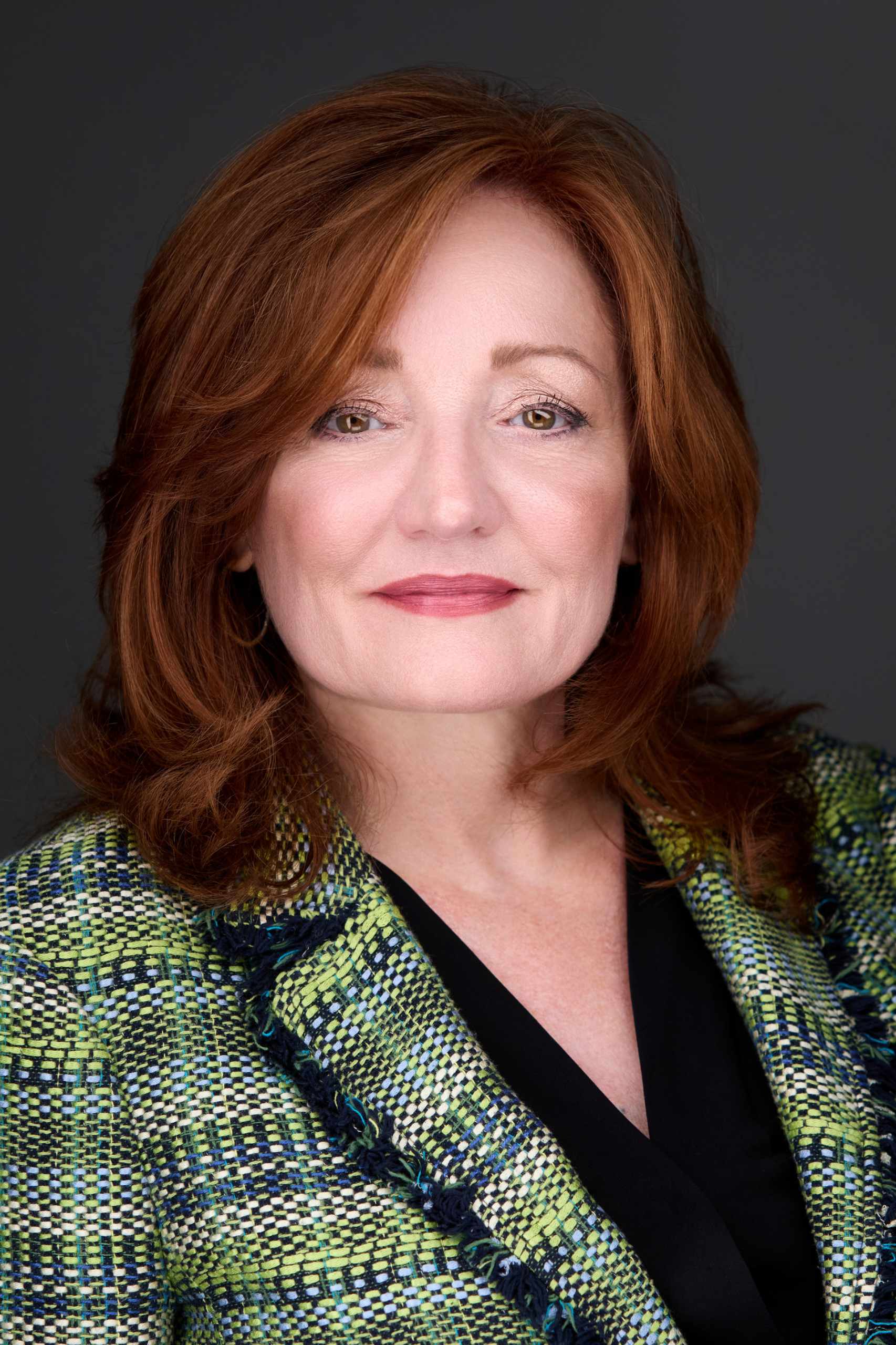 Jennifer Mills Berlingieri, Esq., attorney at Fratello Law, wearing a professional blazer, smiling confidently in a headshot portrait with a neutral background.